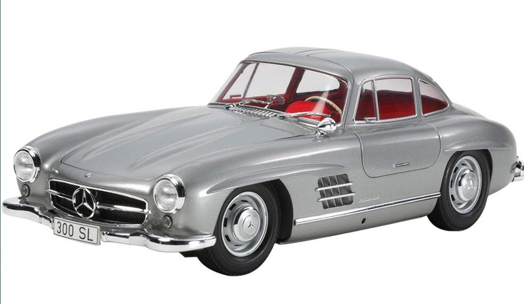Mercedes-Benz 300SL 1/24 This masterpiece was not just a car; it was a statement of resilience, innovation, and the pursuit of automotive perfection, it was a defiant roar of a nation reclaiming its engineering prowess.